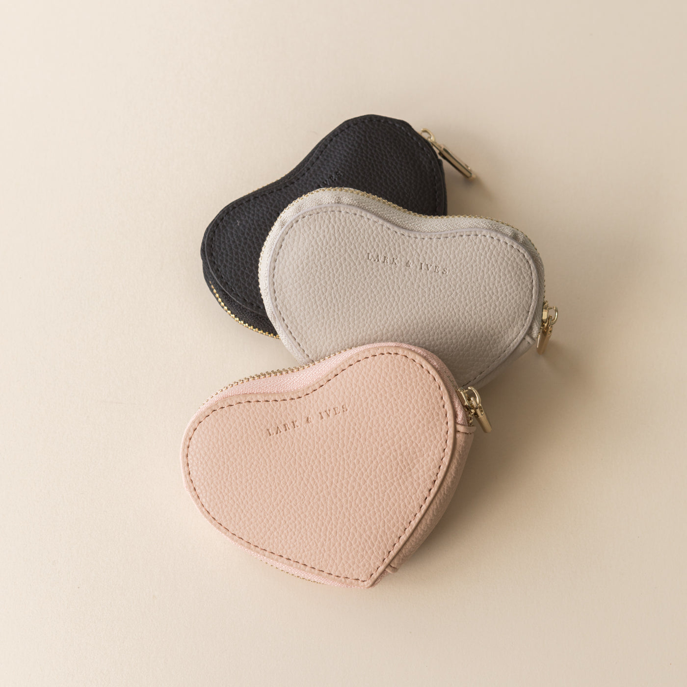Claudia Canova heart shaped coin purse in pale pink